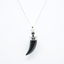 Black Tourmaline Shark's Tooth Pendant with a Garnet Accent in 925 Silver